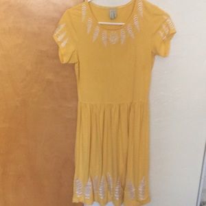 knee length yellow dress